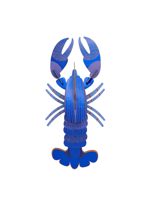 Add a shimmering touch of the sea to your walls with the Lapis Blue Lobster by Studio ROOF, a sculptural 3D decoration made from recycled cardboard.
