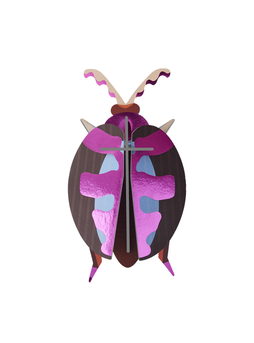 A shimmering pink beetle by Studio ROOF inspired by the beauty of nature.
