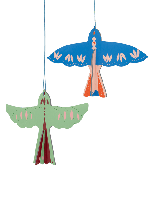 Bring Nordic folk charm to the holidays with Nordic Birds by Studio ROOF, a colourful pair of 3D hanging ornaments made from recycled cardboard.