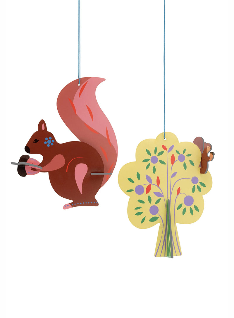 Bring the wonder of a Nordic forest indoors with The Story Tree, a charming pair of colourful 3D ornaments crafted from recycled cardboard.
