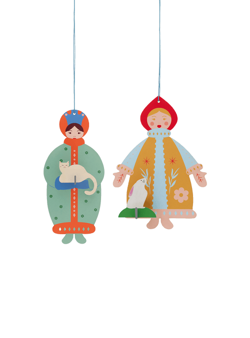 Meet The Winter Sisters by Studio ROOF, a playful pair of 3D hanging ornaments inspired by Nordic folk tales and made from recycled cardboard.