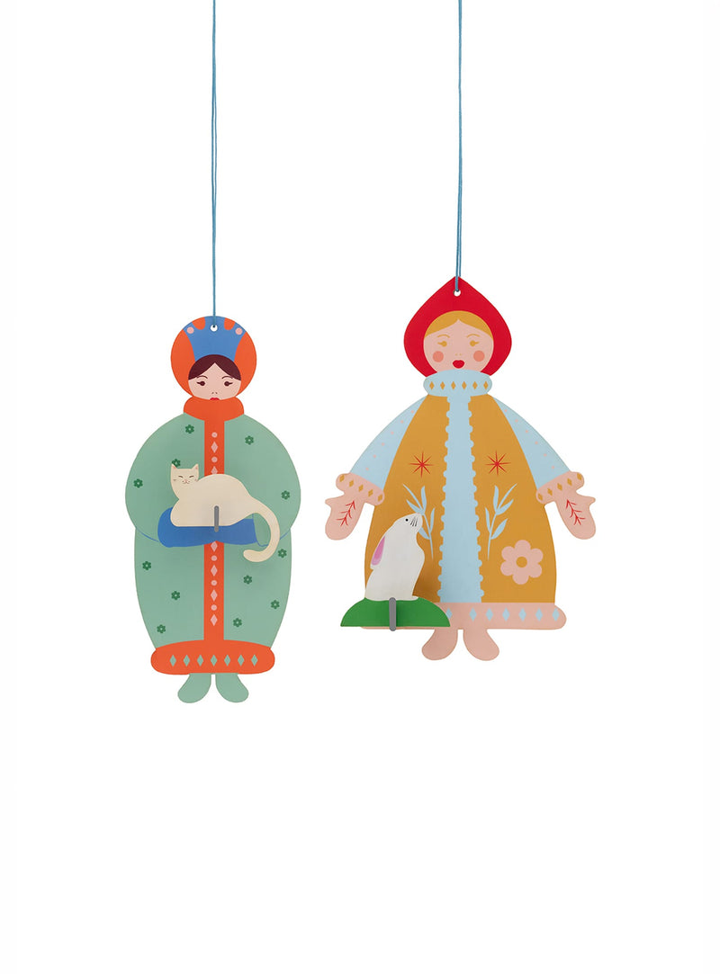 Let The Winter Sisters add a whimsical touch to your holiday décor, with two playful 3D ornaments inspired by Nordic folk tales.